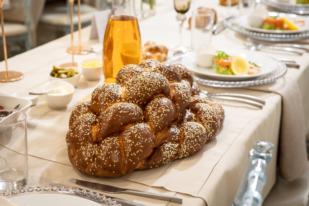 Challah bread on table.