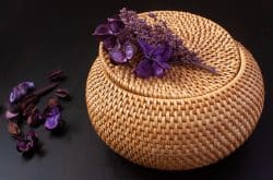 Biodegradable rattan urn for green burial options.